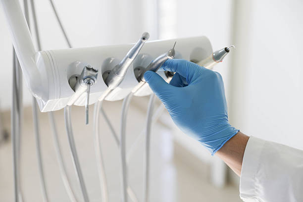 Professional Tooth Extraction technician working in Avon, IN